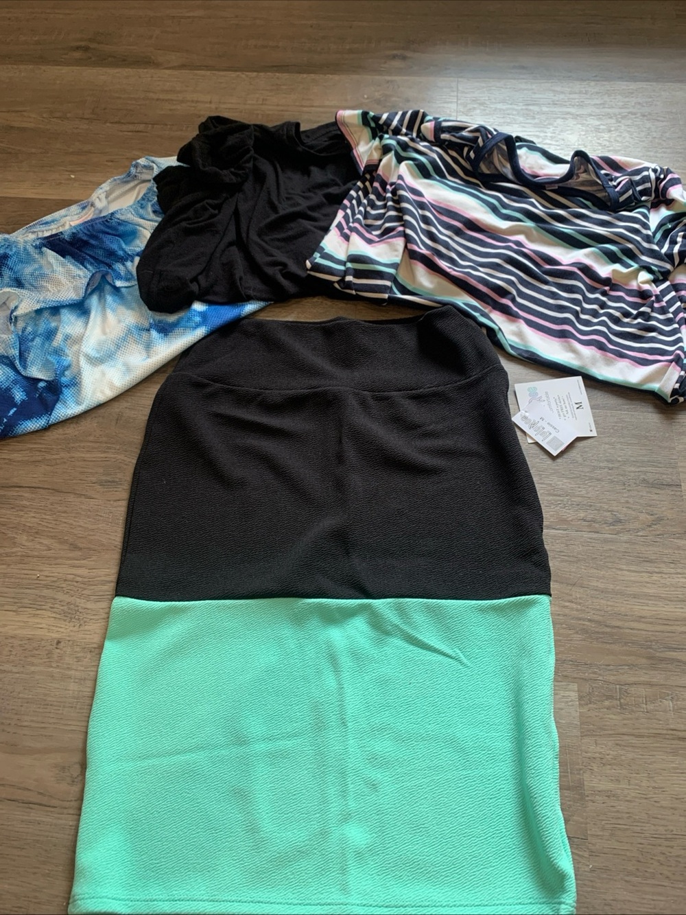 LuLaRoe Women's Bundle of 4 - 3 shirts and 1 skirt